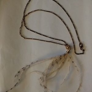 Peach feather pendant necklace